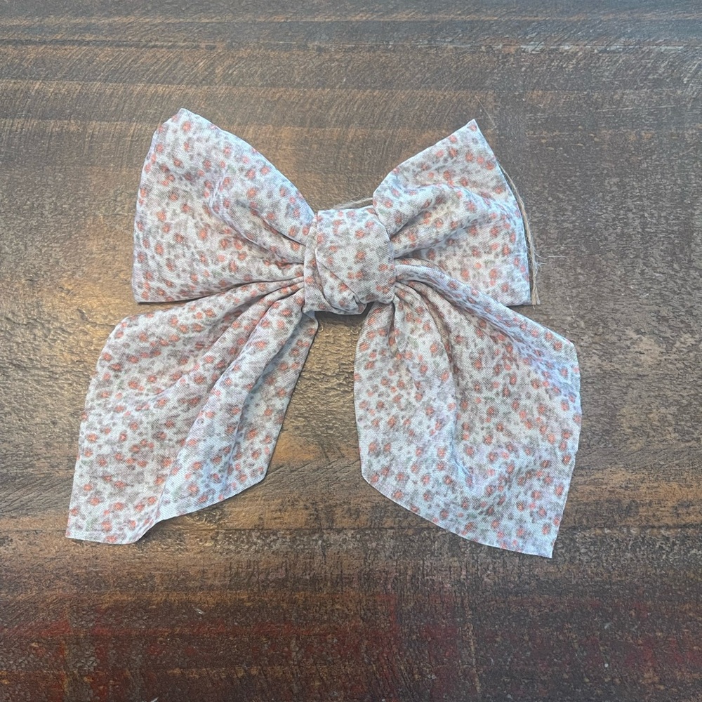 Gray and Orange Hair Accessory with Large Bow Design